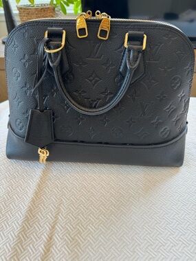 Louis Vuitton Noir Empreinte Neo Alma PM - Authentic. Excellent condition